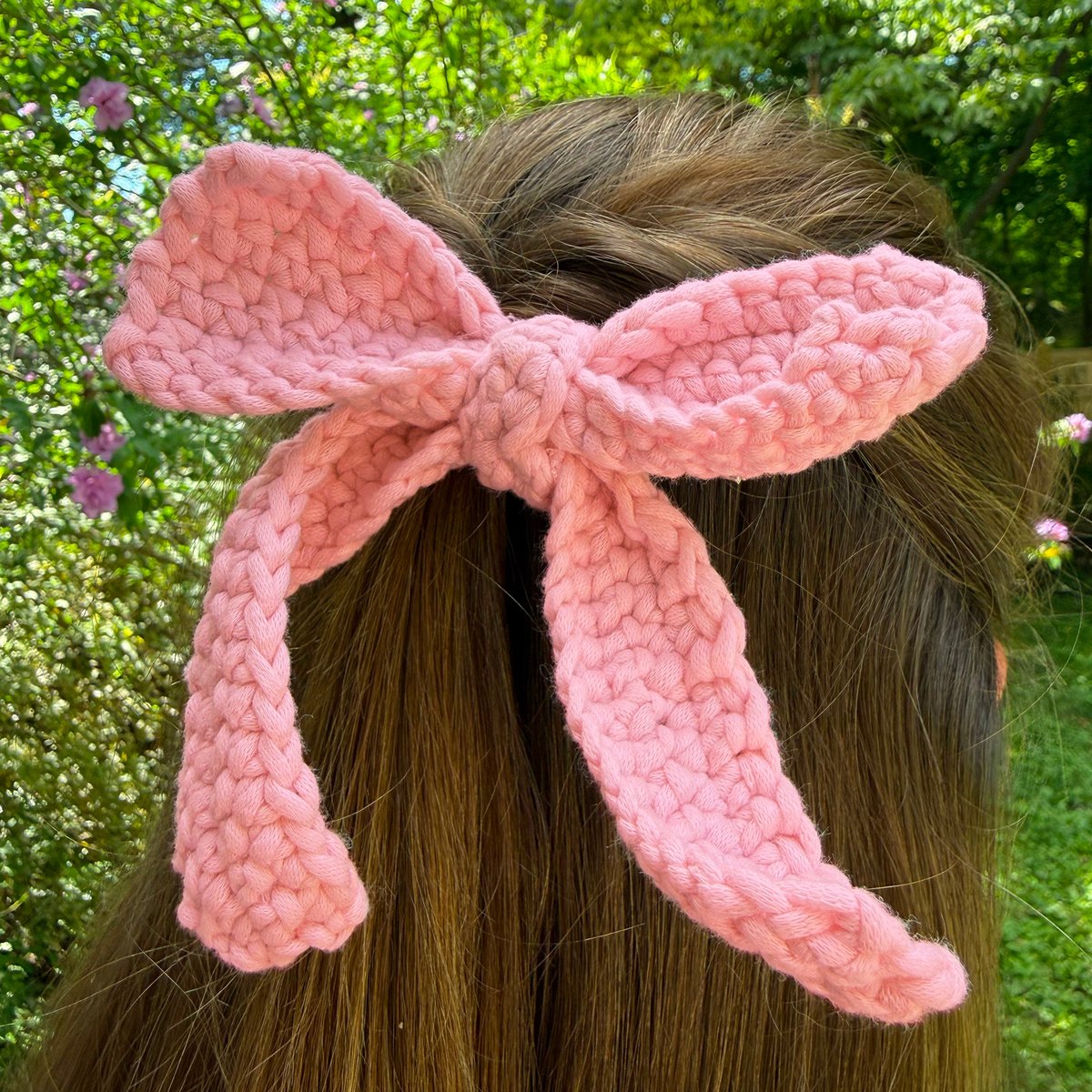 The bow worn in a half-up hairstyle